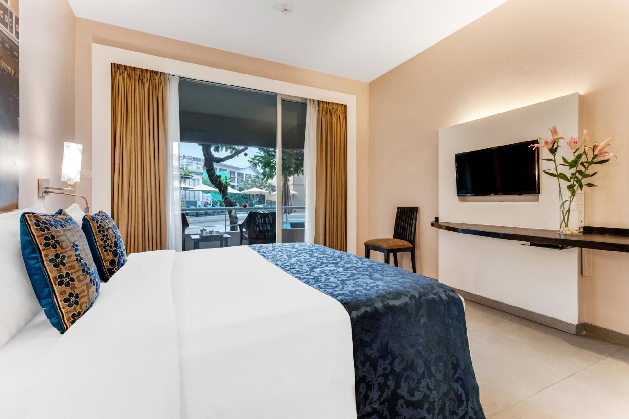 Whispering Palms Beach Resort Candolim Exterior foto